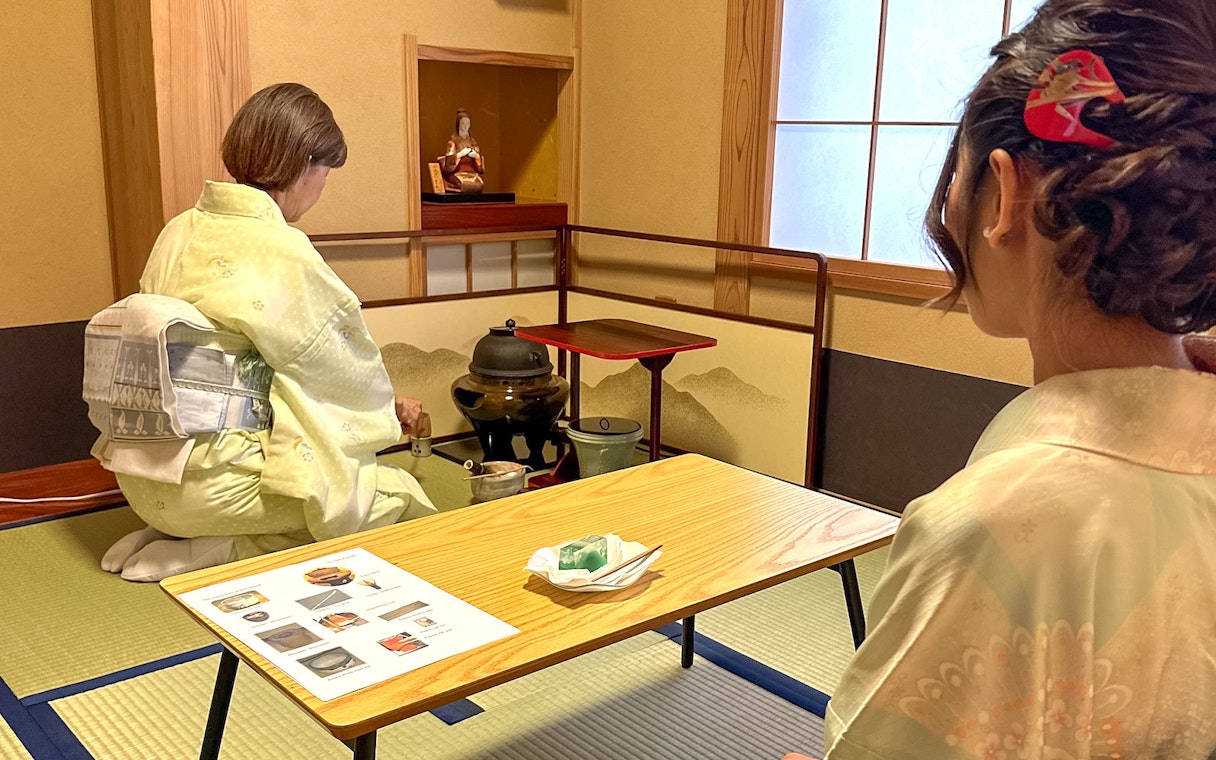 Kimono-clad women participating in a traditional tea ceremony in Shinagawa, Tokyo.