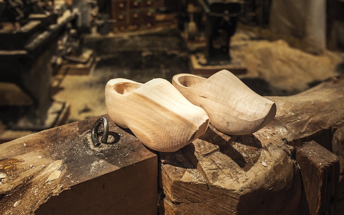 Wooden clogs on a workbench in Zaanse Schans, Netherlands.
