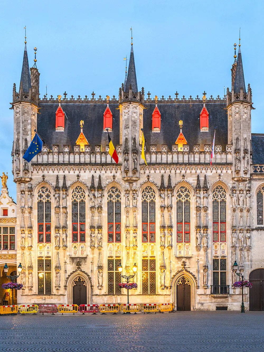 Stadhuis Brugge city hall in Burg Square, Belgium, with Gothic architecture.