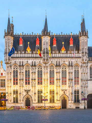 Stadhuis Brugge city hall in Burg Square, Belgium, with Gothic architecture.