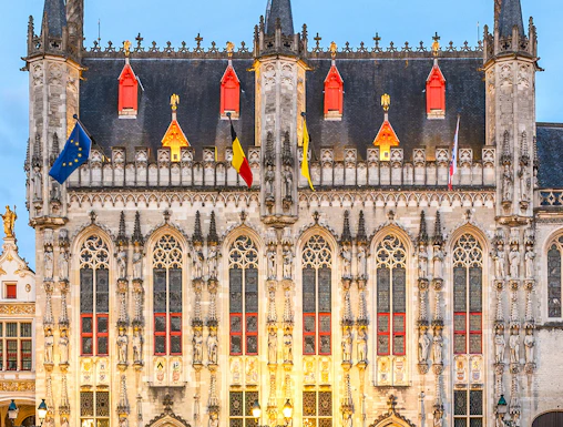 Stadhuis Brugge city hall in Burg Square, Belgium, with Gothic architecture.