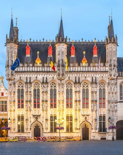 Stadhuis Brugge city hall in Burg Square, Belgium, with Gothic architecture.