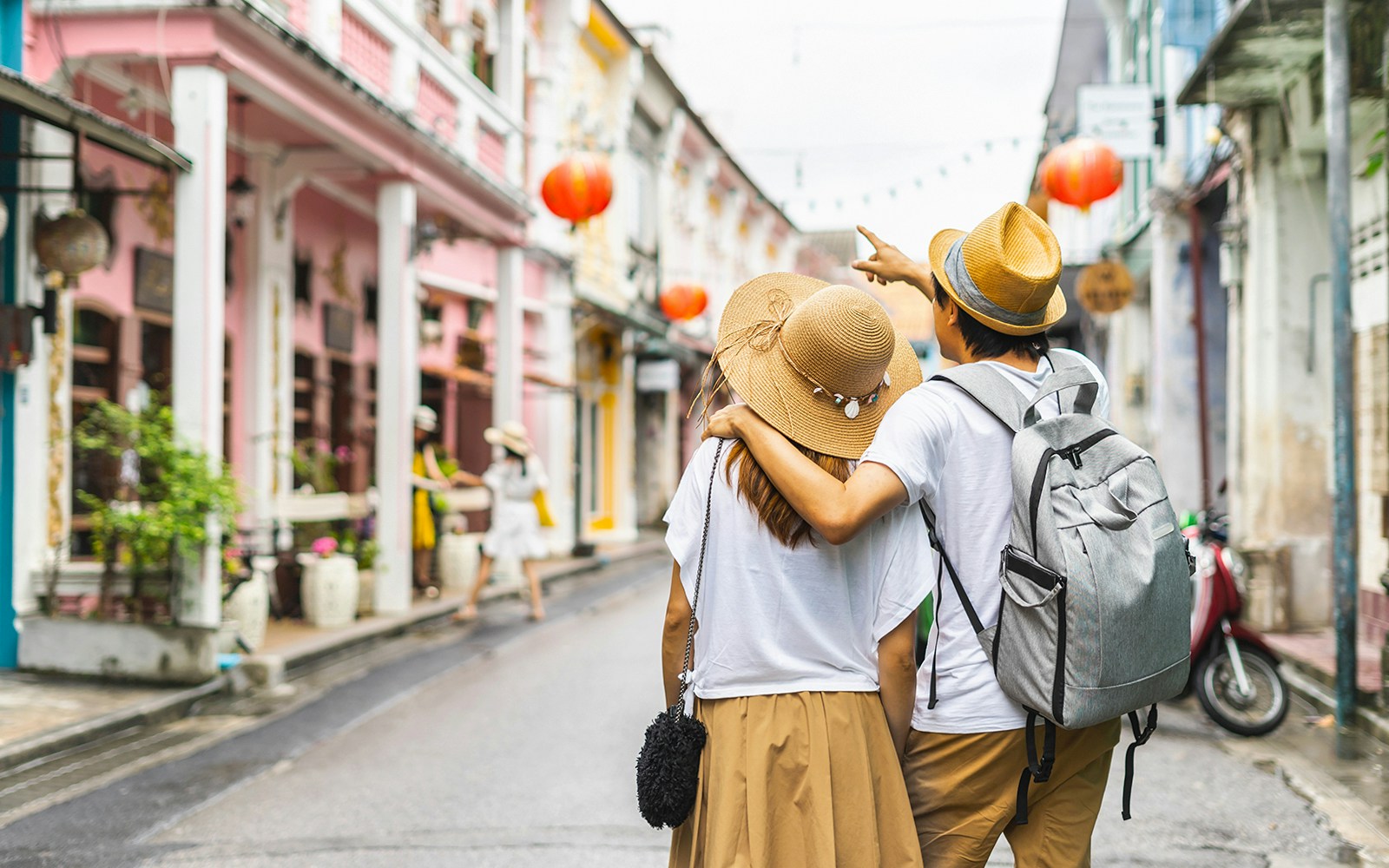 Young couple in Phuket old town in Thailand