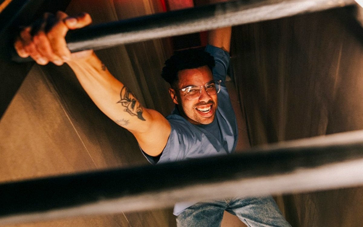 Man climbing a ladder at Prison Island attraction in Perth.