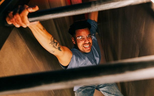 Man climbing a ladder at Prison Island attraction in Perth.