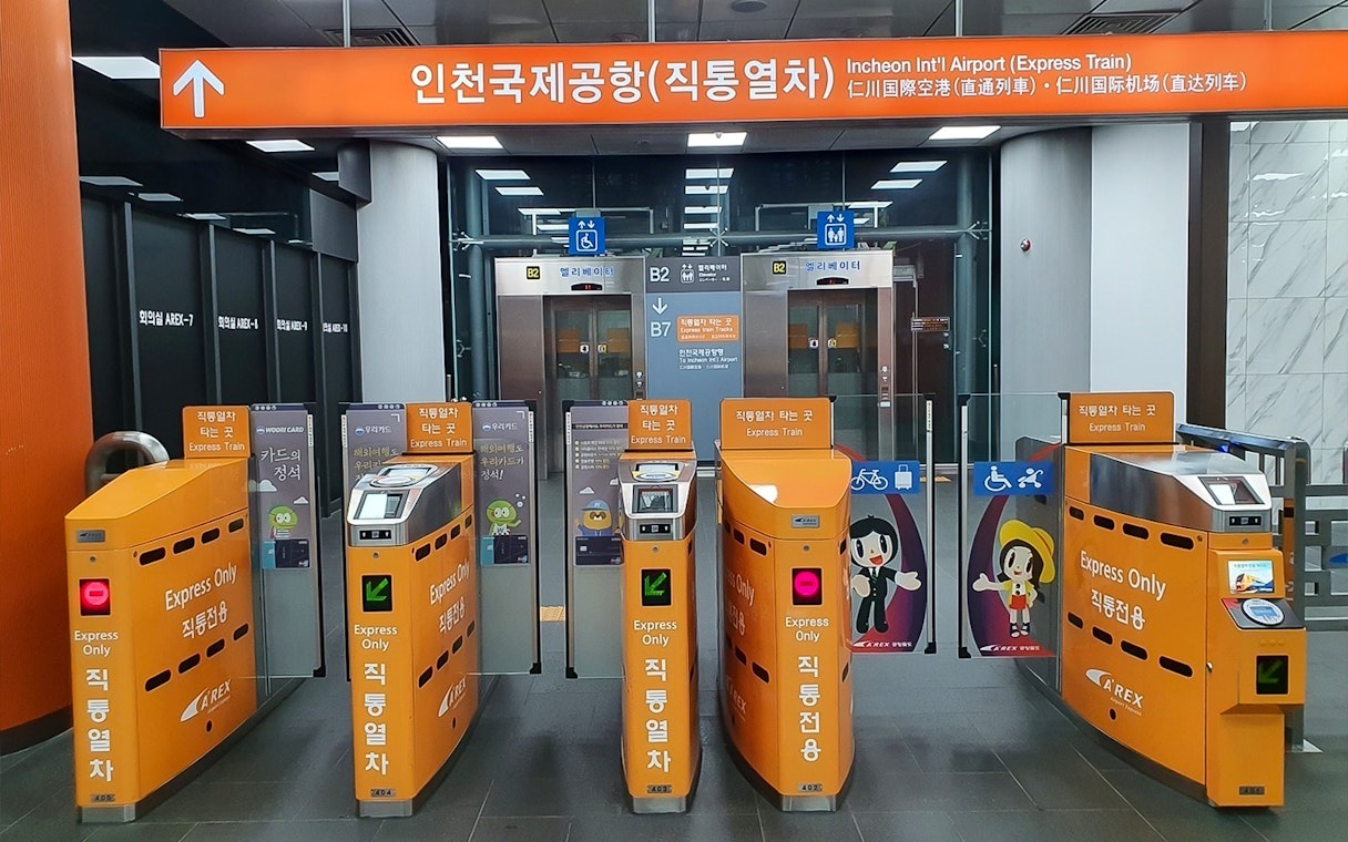 AREX Express Train ticket gates at Incheon International Airport, South Korea.