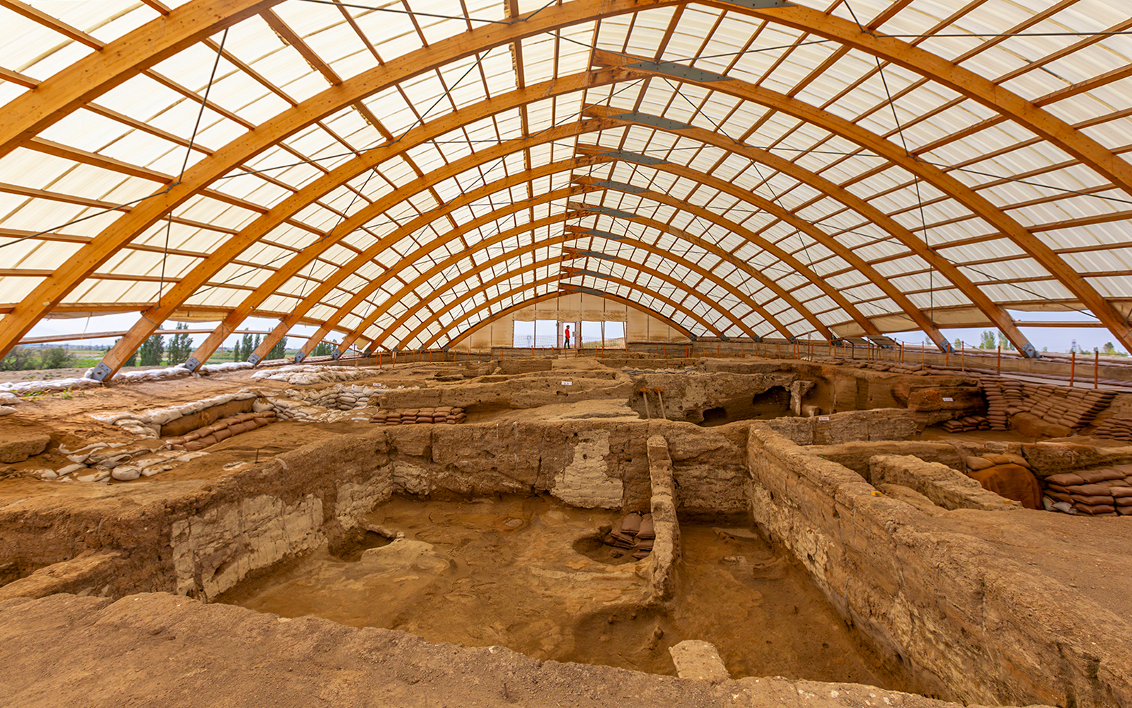 Inside view of Akrotiri Excavations in Santorini under protective structure.