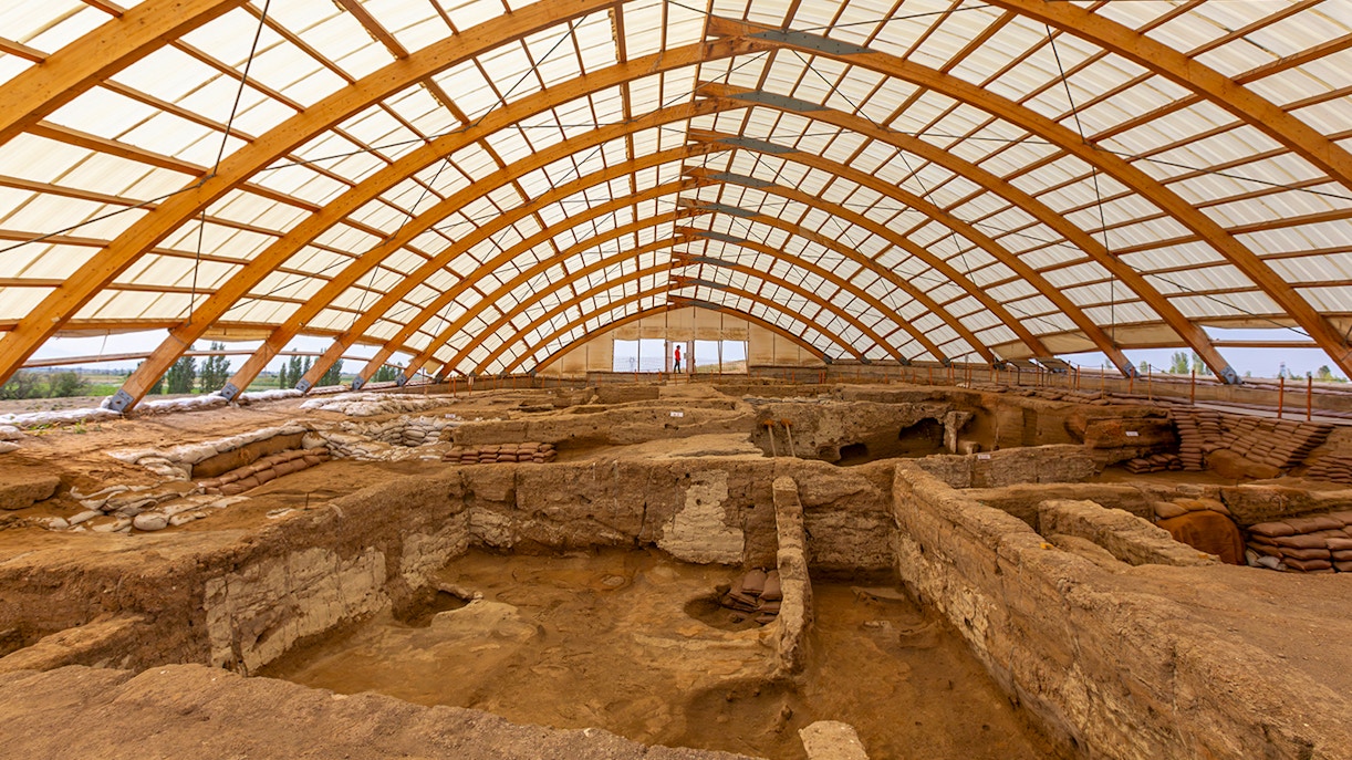 Inside view of Akrotiri Excavations in Santorini under protective structure.