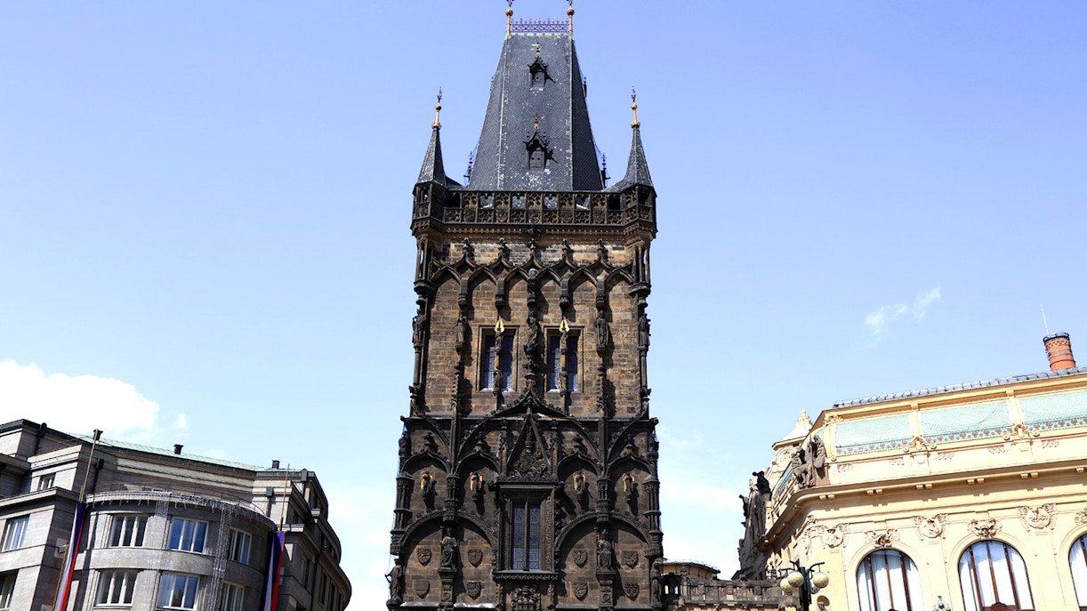 Powder Tower in Prague, Czech Republic, with ornate Gothic architecture.
