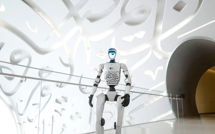 Robot in futuristic hallway at Museum of the Future, Dubai.