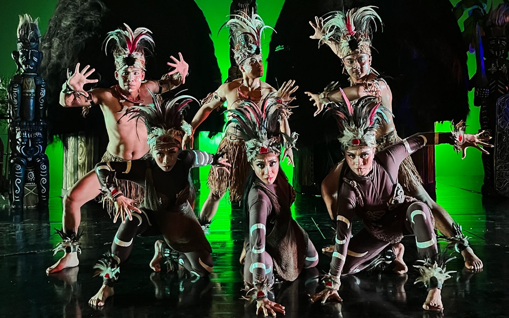 Performers in traditional Indonesian costumes at the Devdan Show, Bali.