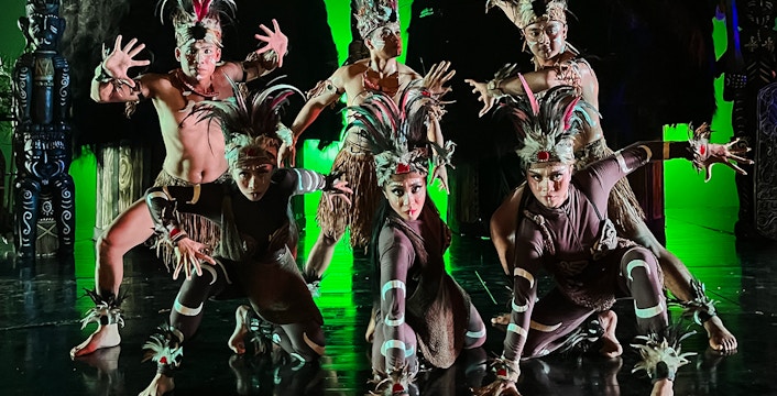Performers in traditional Indonesian costumes at the Devdan Show, Bali.