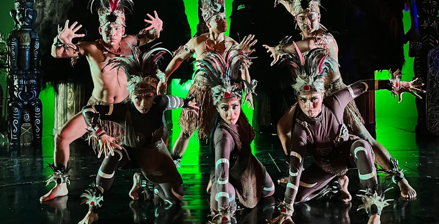 Performers in traditional Indonesian costumes at the Devdan Show, Bali.