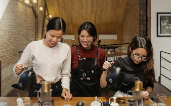 Vietnamese coffee workshop with participants brewing coffee.