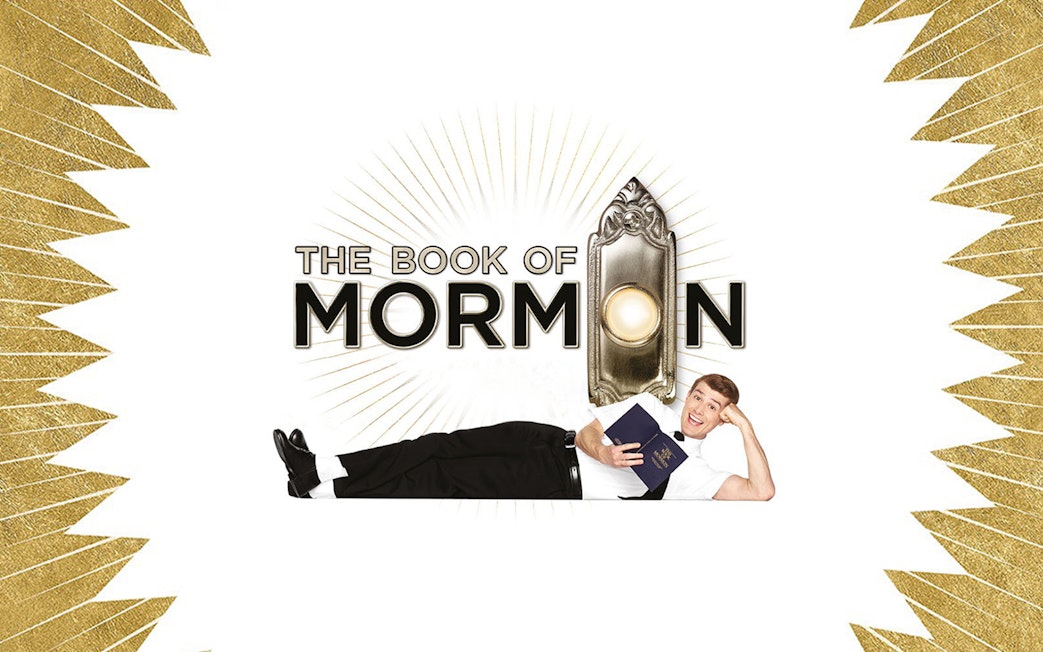 The Book of Mormon logo with a smiling man holding a book.