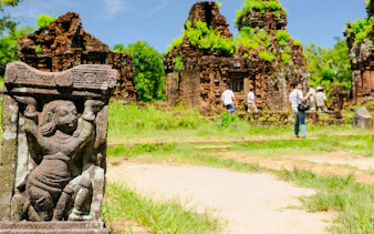 Ancient stone sculpture and temple ruins at My Son Sanctuary, Vietnam.