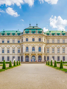 Belvedere Palace in Vienna with green domes and manicured gardens.