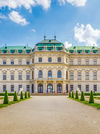 Belvedere Palace in Vienna with green domes and manicured gardens.