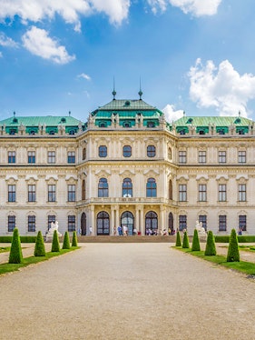 Belvedere Palace in Vienna with green domes and manicured gardens.