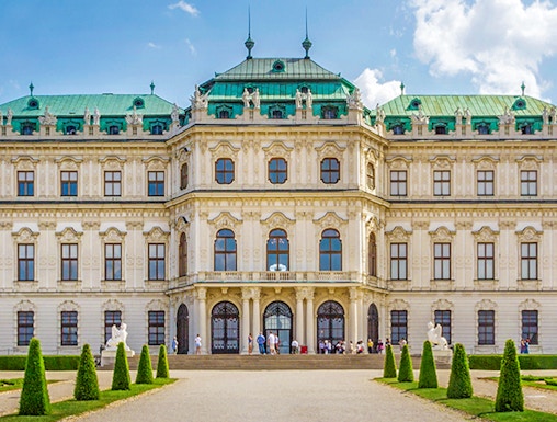 Belvedere Palace in Vienna with green domes and manicured gardens.