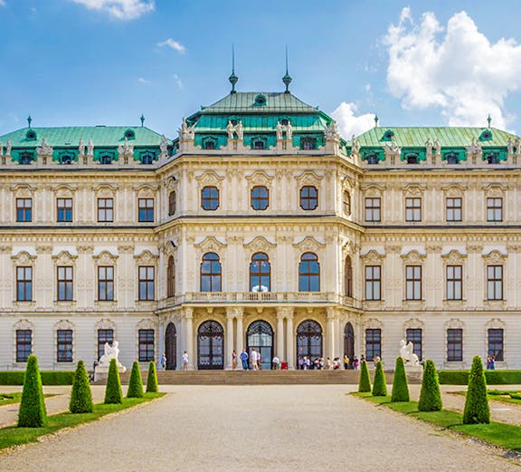 Belvedere Palace in Vienna with green domes and manicured gardens.