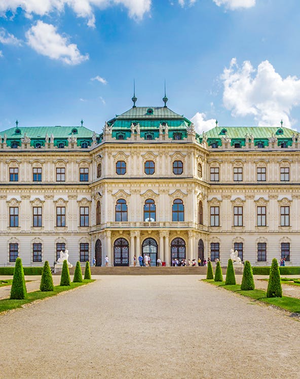 Belvedere Palace in Vienna with green domes and manicured gardens.