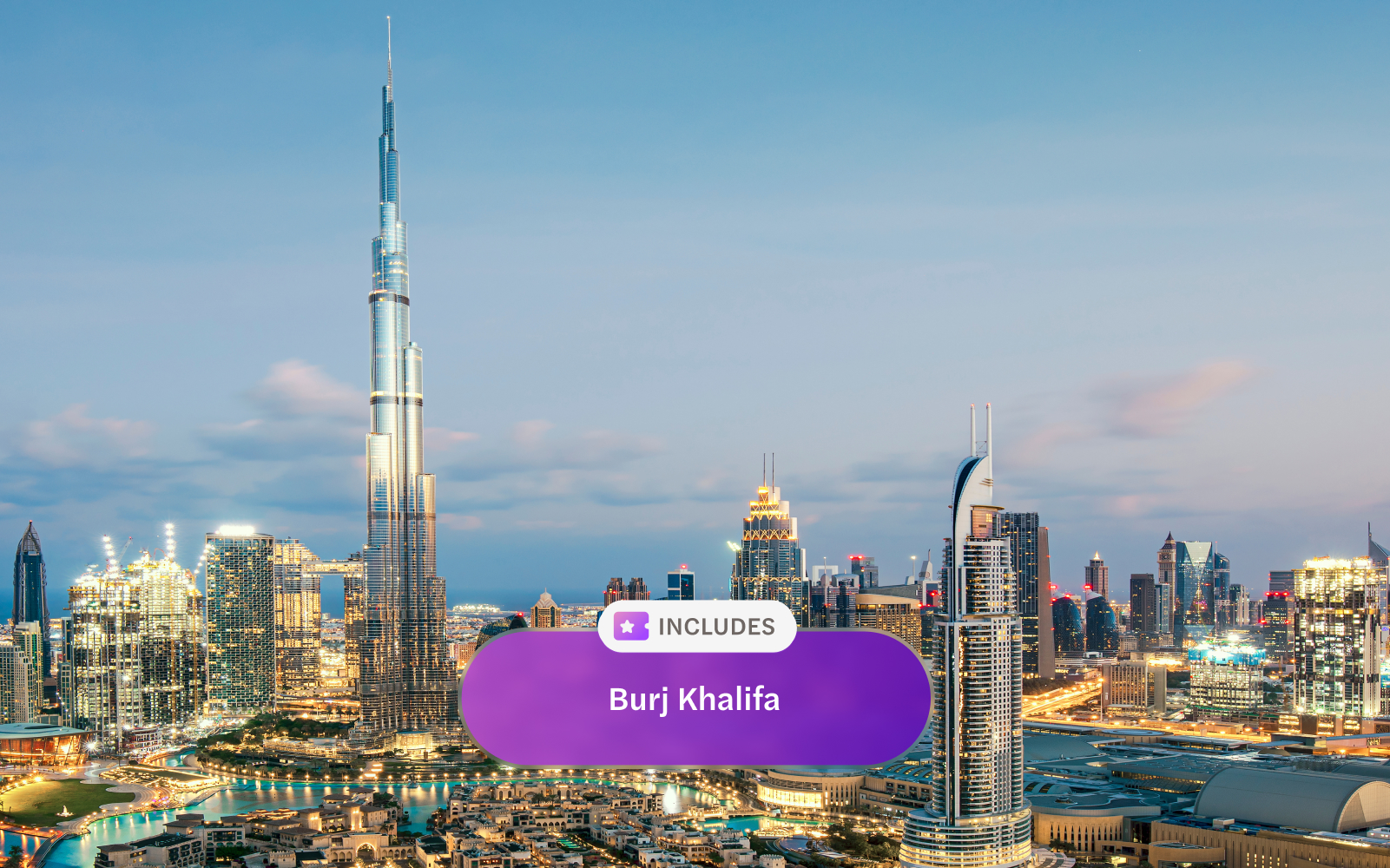 Burj Khalifa towering over Dubai skyline at dusk.