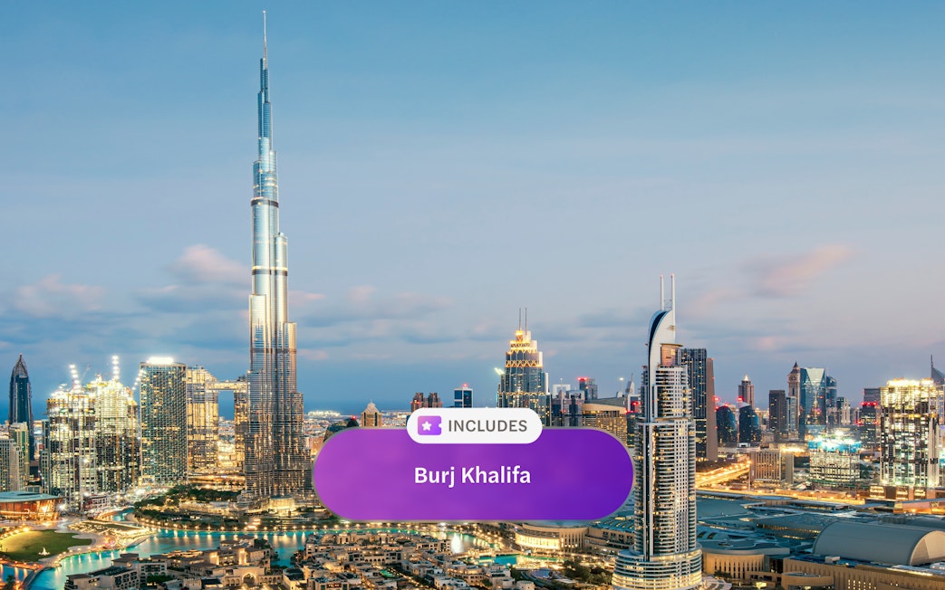 Burj Khalifa towering over Dubai skyline at dusk.