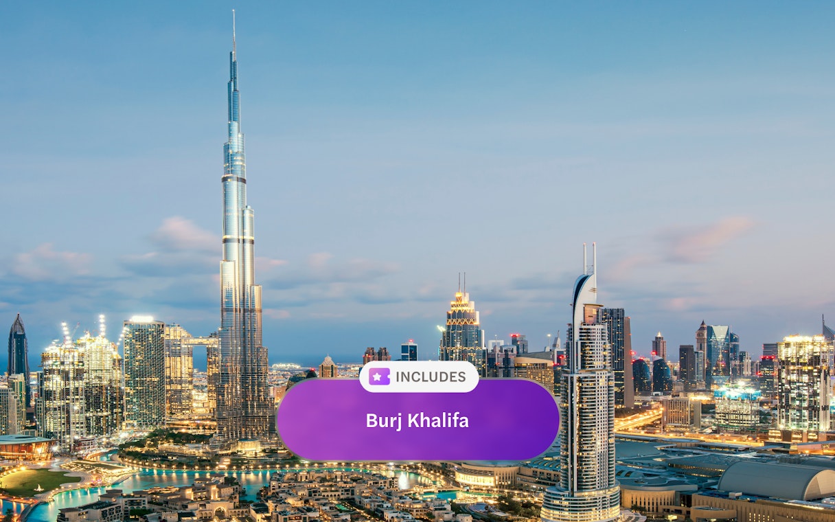 Burj Khalifa towering over Dubai skyline at dusk.