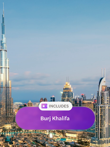 Burj Khalifa towering over Dubai skyline at dusk.