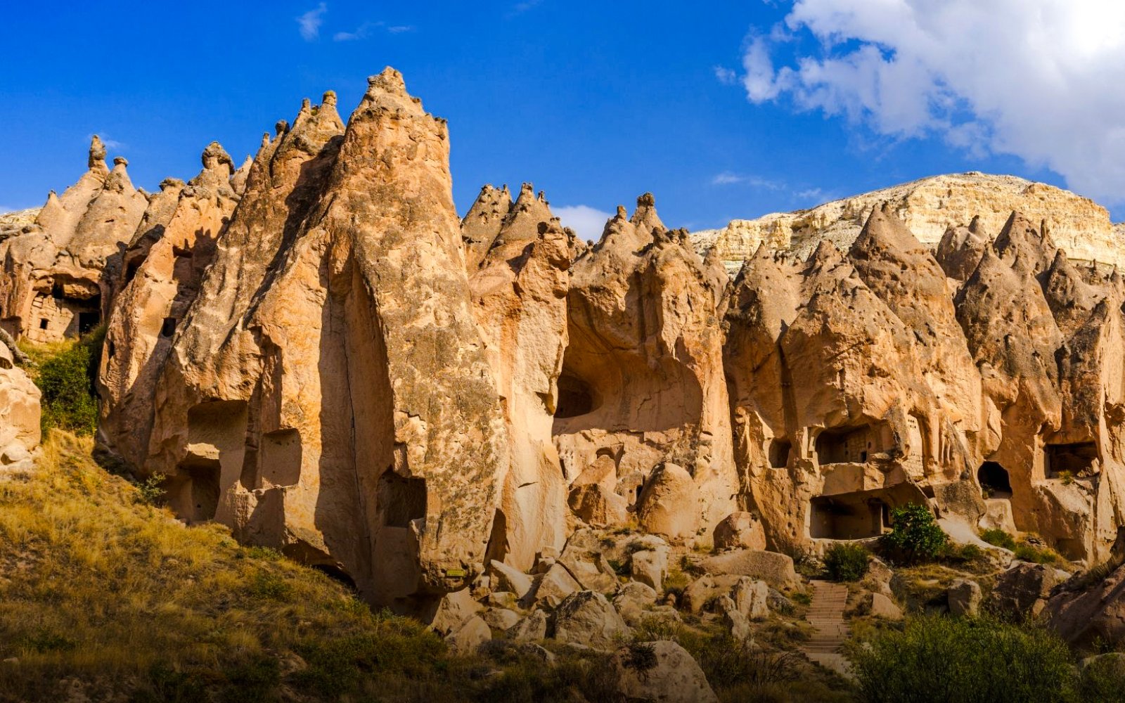 Rock formations and cave dwellings in Zelve Valley, Cappadocia.