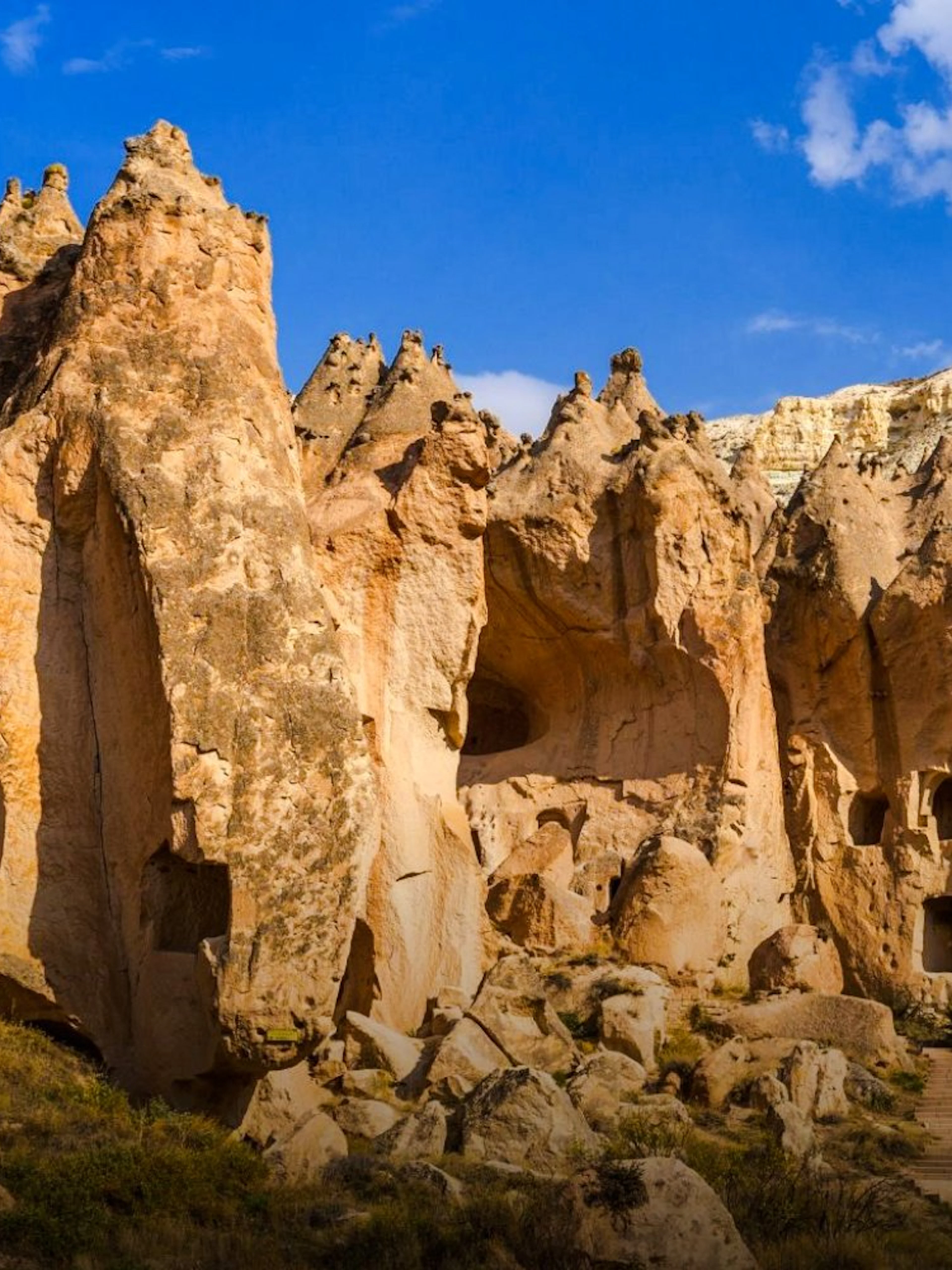 Rock formations and cave dwellings in Zelve Valley, Cappadocia.