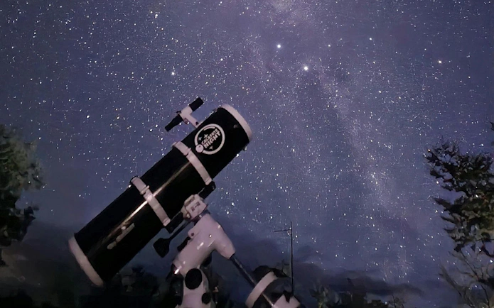 Telescope under starry sky in Calafate for astrotourism experience.