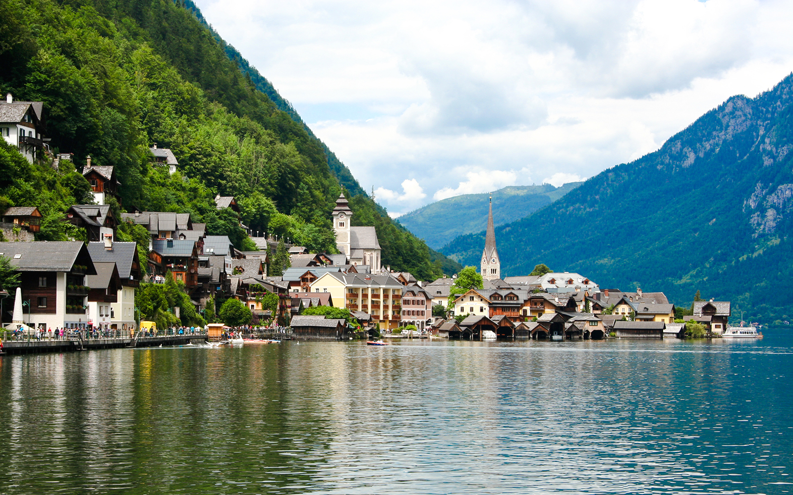Hallstatt old town with lakeside view and church spire, Austria.
