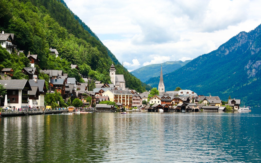 Hallstatt old town with lakeside view and church spire, Austria.