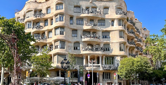 Casa Mila in Barcelona with its unique stone facade and wrought iron balconies.