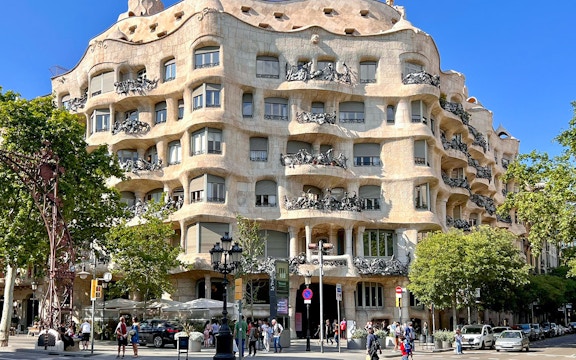 Casa Mila in Barcelona with its unique stone facade and wrought iron balconies.