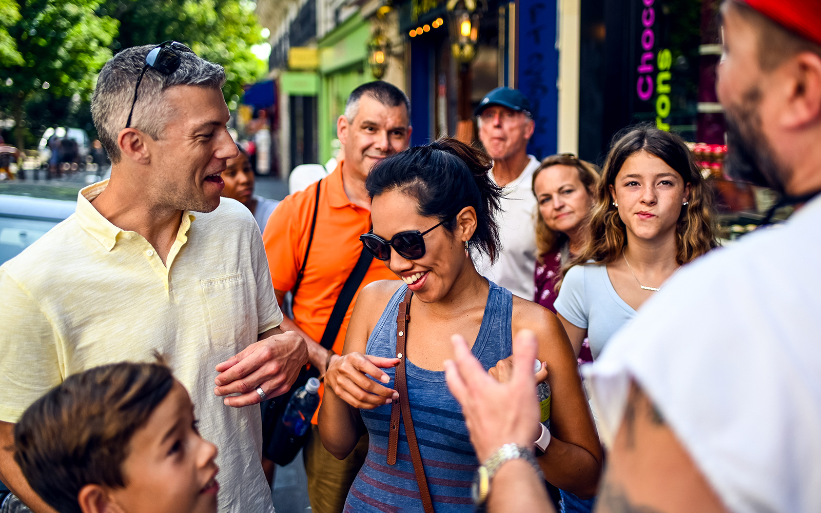 Group enjoying a guided food tour in Montmartre, Paris.