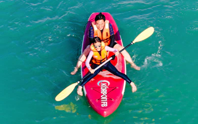 Kayakers paddling during Langkawi Sunset Cruise.