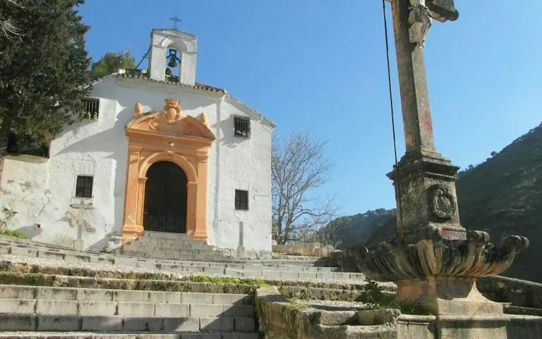 Chapel of Sacromonte Abbey with stone cross, Granada.