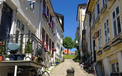 Steep cobblestone alleyway in Strangebakken, Nordnes neighborhood, Bergen, Norway.