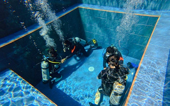 usat liberty shipwreck & coral garden beginner dives with private guide and round-trip hotel transfers-4