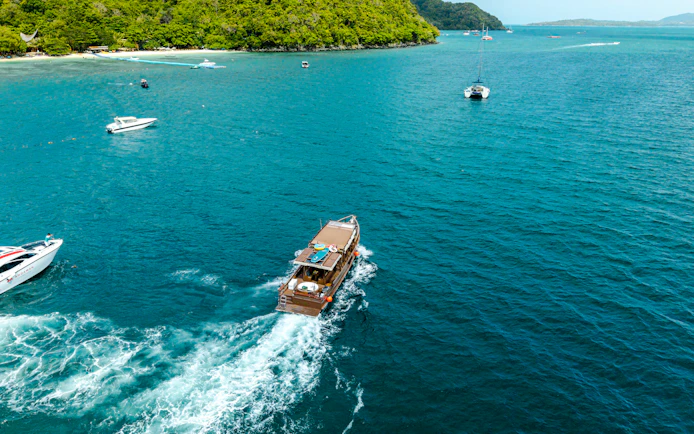 Phuket Private Longtail Boat Charter with Jacuzzi to Coral Island Banana Beach and Promthep Cape