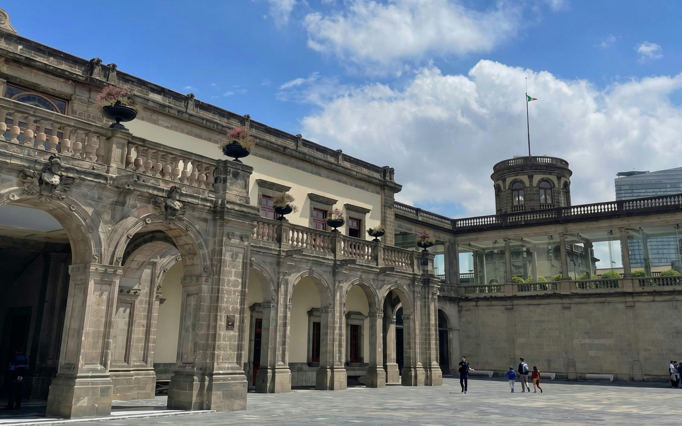 Chapultepec Castle courtyard with arched stone architecture in Mexico City.