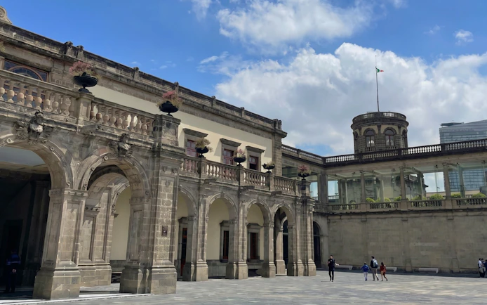 Chapultepec Castle courtyard with arched stone architecture in Mexico City.