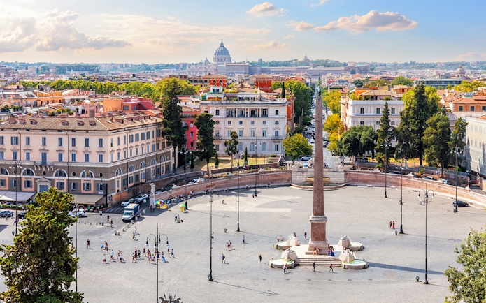 Egyptian Obelisk and fountains in Piazza del Popolo, Rome, with cityscape.