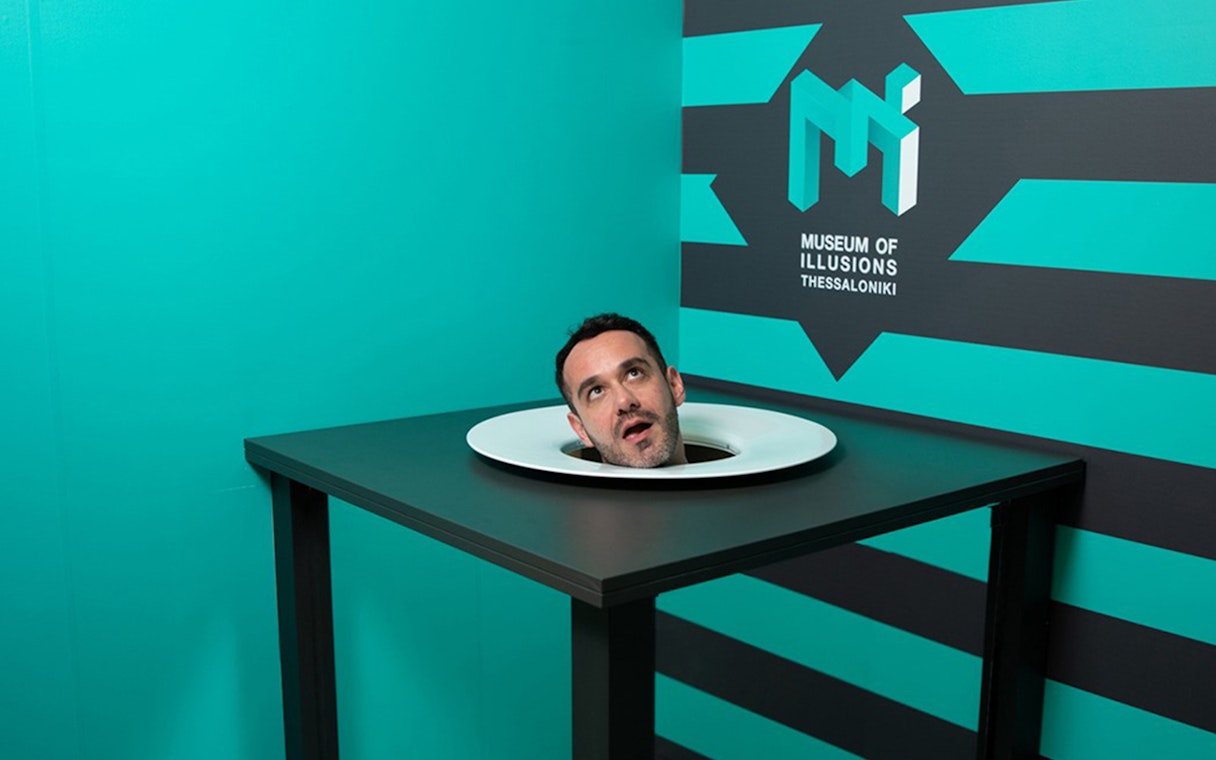 Head illusion exhibit at Museum of Illusions Thessaloniki.