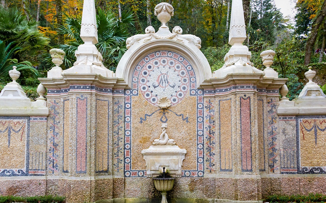 Abundance Fountain with intricate mosaic at Quinta da Regaleira, Sintra, Portugal.