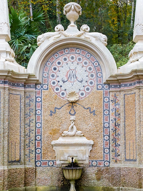 Abundance Fountain with intricate mosaic at Quinta da Regaleira, Sintra, Portugal.