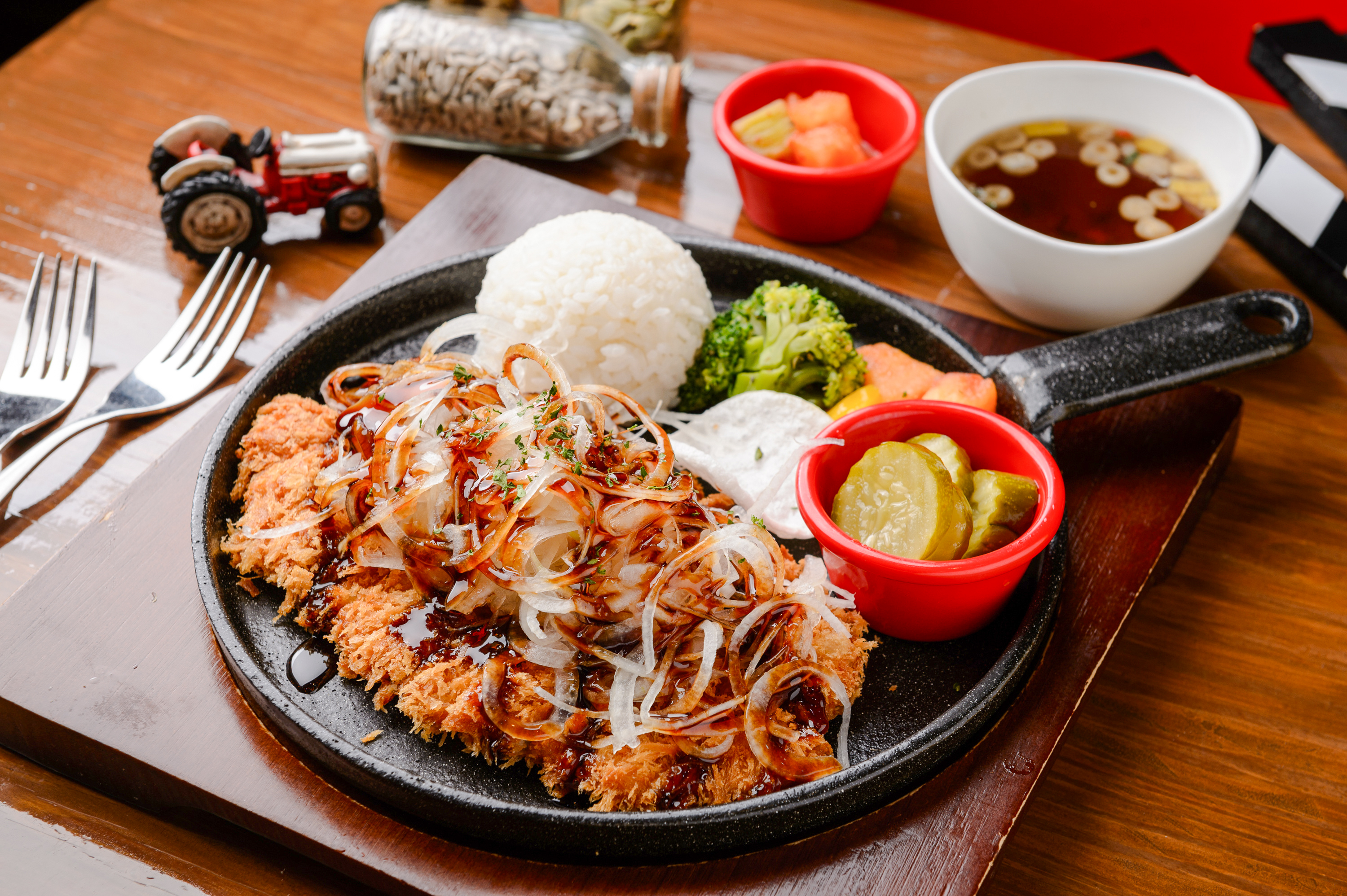 Gyukatsu set with breaded beef cutlet, rice, and cabbage in a Tokyo restaurant.